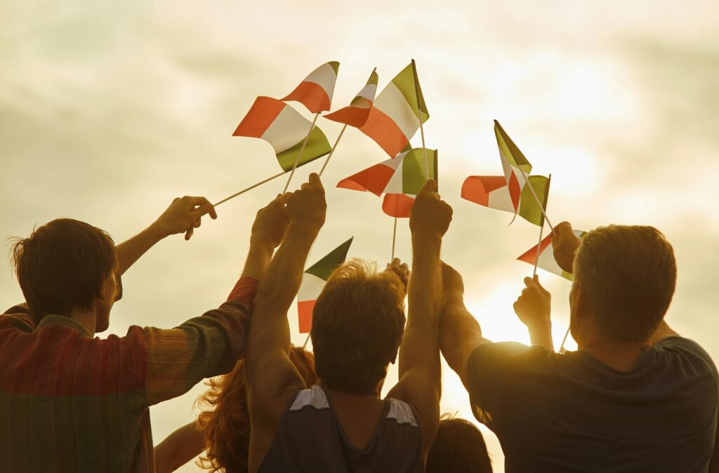 Glowing sun on patriotic italian people.